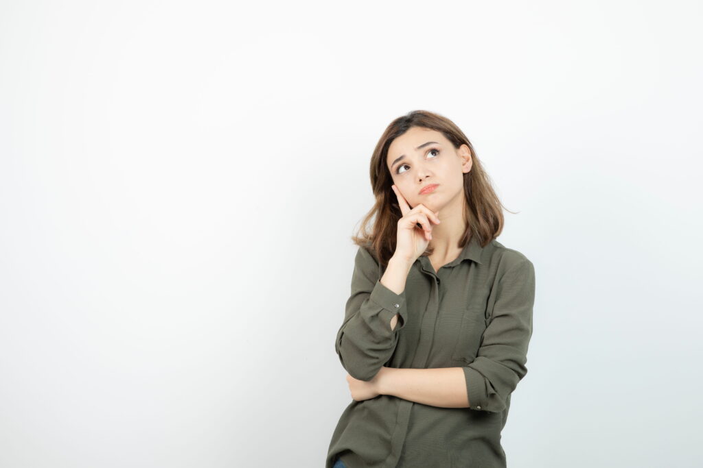 adorable young woman casual outfit standing thinking high quality photo (1)